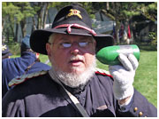Lt. Ron Aronis describes types of artillery shells to an audience at the Trimborn Farm Civil War weekend.